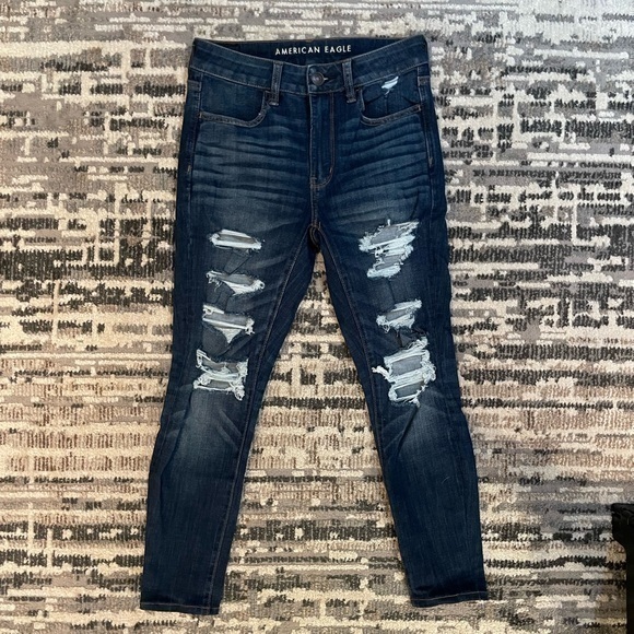 American Eagle | Highrise Next Level Stretch Destressed Dark Blue Jean - Picture 3 of 11